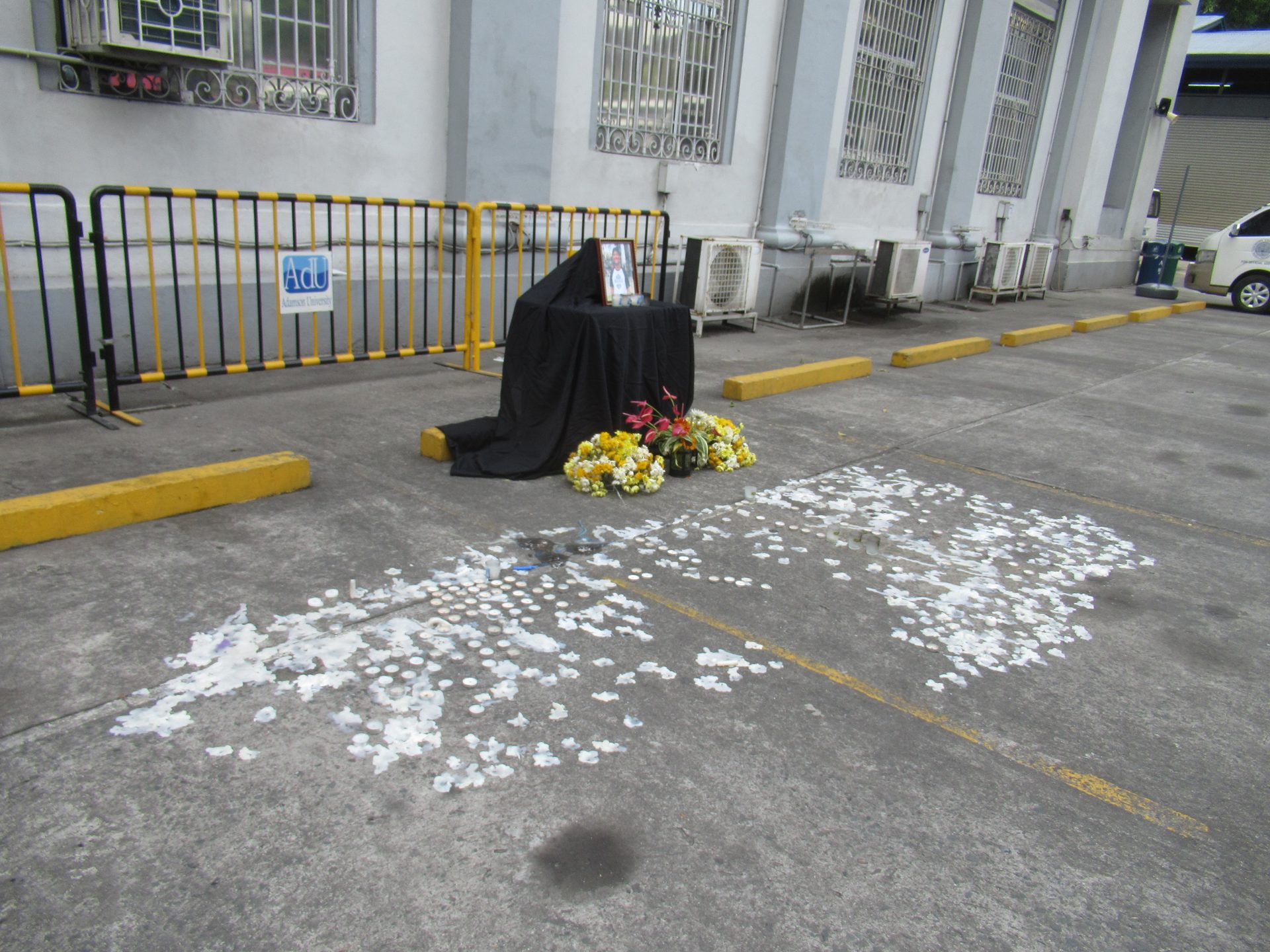 Mourners at a candlelight vigil